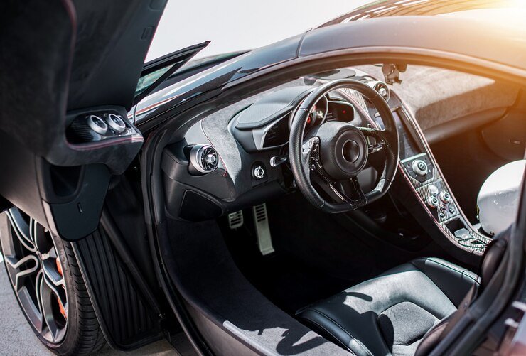 black-sport-car-front-side-salon-view-black-wheel-with-metallic-silver-color-direction-door-open_114579-1166